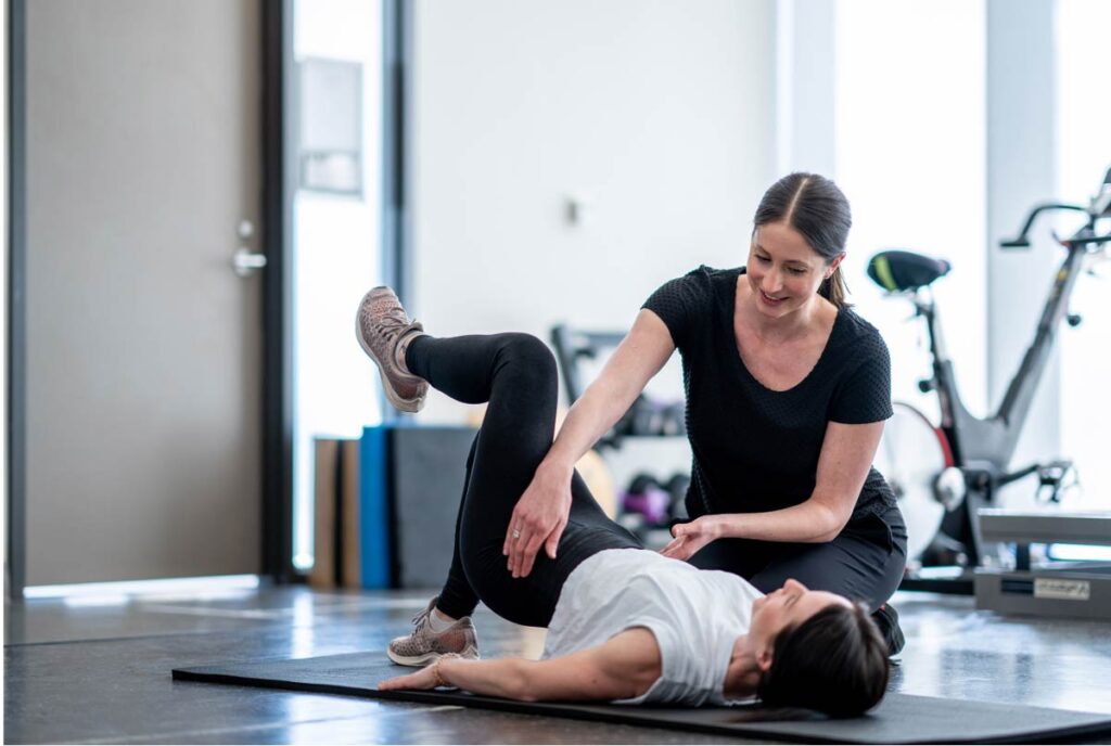 Physiotherapist discussing pelvic floor treatment options with a concerned patient