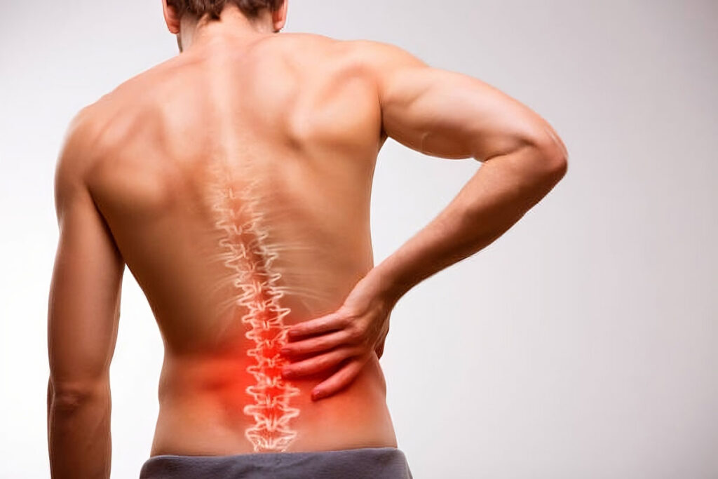 Illustration of the lumbar region highlighting musculoskeletal strain"